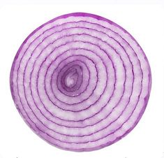 an onion sliced in half on a white background