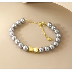 Style: Women Fashion Material: S925 Sterling Silver Pearl Type: Swarovski Pearl Pearl Color: Grey Bracelet Length: 16+5cm Elegant Charm Bracelet For Anniversary, Elegant Anniversary Charm Bracelet, Elegant Sterling Silver Chain Bracelet For Party, Elegant Metal Pearl Bracelet As Gift, Elegant Metal Pearl Bracelet For Gift, Elegant Crystal Bracelet With Adjustable Chain, Elegant Adjustable Charm Bracelet, Elegant Beaded Bracelets With Adjustable Chain For Party, Adjustable Elegant Sterling Silver Crystal Bracelet