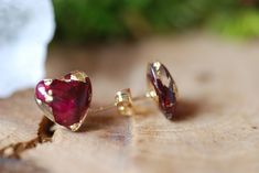 Heart Red Rose Flowers with 24K Gold Flakes Resin Stud Earrings A tiny heart shape floral stud earrings made with red rose petals and 24K Gold flakes in Eco resin into a gold plated over brass post and earring back. All natural ingredients gathered around my dwelling. Earrings diameter measure from 10mm. Please notice that the rings are truly handmade and some bubbles may appear since it is an artisan product from beginning to end. Every single one of my pieces has been uniquely designed by me w Rose Gold Ruby Earrings For Gifts, Red Heart-shaped Earrings For Her, Gold Flower Earrings For Valentine's Day, Elegant Red Heart Earrings For Gift, Red Heart Earrings For Gift, Red Round Heart Earrings For Gift, Gold Heart-shaped Flower Earrings, Gold Flower Earrings For Valentine's Day Anniversary, Gold Flower Earrings For Anniversary On Valentine's Day