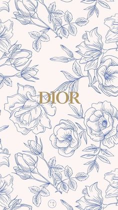 a blue and white floral pattern with the word dior written in gold on it