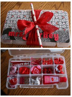 an open box filled with valentine's day candies and lollipops