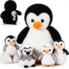 a stuffed penguin and its babies are posed together