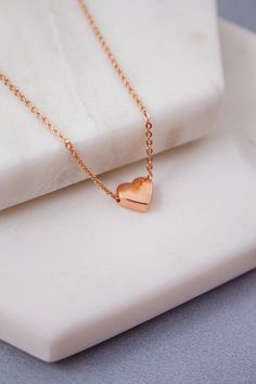 Dainty and stylish Rose gold small Heart charm necklace is great to wear for everyday or special occasions Available in rose gold SIZE ♥ Chain Length : 16.5 '' ( as pictured ) Please you can CHOOSE your chain length( 15 inches - 18 inches ) before purchasing this item ! * necklace sizes * 15 inches: around neck 16 inches: standard short 17 inches: average length 18 inches: standard long SHIPPING TIME Fast shipping within 1 - 3 days **Your order will be ready to be shipped within 3 business days Rose Gold Heart Necklace For Her, Rose Gold Heart Necklace As A Gift For Her, Rose Gold Heart Necklace Gift For Her, Rose Gold Heart Necklace With Clavicle Chain For Anniversary, Rose Gold Dainty Necklace For Valentine's Day, Rose Gold Heart Charm Necklace For Anniversary, Rose Gold Necklaces With Delicate Chain For Valentine's Day, Dainty Rose Gold Necklace For Her, Delicate Rose Gold Heart Necklace For Mother's Day