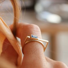 Elevate your style with our stunning collection of handcrafted gold rings on Etsy. From classic baguette cut designs to modern geometric shapes, each piece is meticulously crafted to perfection. Our zircon embellished rings add a touch of sparkle, while our minimalist and stackable options offer versatility for everyday wear. Whether you're celebrating an anniversary, birthday, or searching for the perfect Mother's Day gift, our delicate and handmade rings are sure to delight. Available in rose gold, yellow gold, or 14k white gold, each ring is a timeless treasure to cherish. Shop now and discover the beauty of handcrafted jewelry. Modern Rings With Baguette Diamonds, Modern Stackable Rings With Ethical Gemstones In 14k Gold, Modern Baguette Cut Sapphire Ring, Modern Open Ring With Baguette Diamonds, Modern Gold Stackable Rings With Baguette Cut, Modern Gold Baguette Cut Stackable Rings, Modern Gold Sapphire Ring For Everyday, Modern 14k Gold Emerald Cut Stackable Rings, Minimalist Baguette Cut Ring With Polished Finish