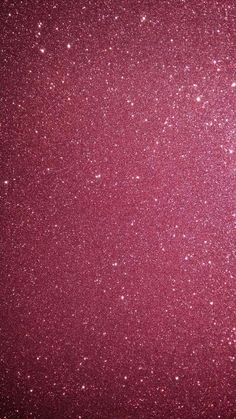 pink glitter textured background with white stars on the left and right side of the image