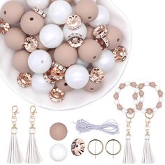 PRICES MAY VARY. 【61PCS Silicone Bead Keychain Making Kit】:You will receive 28 15mm silicone beads, 28 10mm rhinestone spacer beads, 2 tassels, 2 keychain metal rings and 2-meter long elastic rope.Beads hole size is about 2mm, Easy to thread，Can be made into 2 silicone key ring bracelet. 【High Quality Silicone Beads】:These silicone beads for jewelry bracelets making kit are made of high quality silicone, soft and smooth, no seams, uniform holes, durable and sturdy, won’t be worn or fade, odorles Heishi Jewelry, Silicone Bead Keychain, Silicone Wristlet, Keychain Wristlets, Key Ring Bracelet, Classy Rooms, Jewelry Keychain, Rubber Bead, Bracelets Making