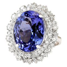 Stamped: 14K White GoldTotal Ring Weight: 9.7 GramsRing Length: N/ARing Width: N/AGemstone Weight: Total Natural Tanzanite Weight is 11.75 Carat (Measures: 16.92x12.92 mm)Color: BlueDiamond Weight: Total Natural Diamond Weight is 2.00 CaratColor: F-G, Clarity: VS2-SI1Face Measures: 26.08x22.48 mmSku: [703547W] Formal Cluster Gemstones Fine Jewelry, Formal Tanzanite Fine Jewelry, Formal Tanzanite Ring With 17 Jewels, Formal Tanzanite Rings With Prong Setting, Tanzanite Rings With 17 Jewels For Anniversary, Formal Tanzanite Diamond Ring With Round Cut, Formal Tanzanite Fine Jewelry Gemstones, Formal Tanzanite Diamond Ring With Prong Setting, Formal Tanzanite Fine Jewelry Rings