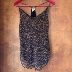 Size Medium 100% Silk: Black/Brown Leopard Print Over Black Lining Non-Adjustable Spaghetti Straps Cowl Neck Front Gathered Racerback Never Worn. Silk Neutral Animal Leopard Print Pattern Maximalist Luxury Workwear Career Boss Babe Edgy Luxe Rocker Chic Boho Bohemia Vamp Y2k Cami Camisole Brown Stretch Camisole For Summer, Chic Brown Tank Camisole, Chic Brown Camisole Tank Top, Stretch Brown Camisole For Summer, Brown Stretch Cami Tank Top, Brown Stretch Tank Top For Night Out, Brown Tank Top For Night Out In Spring, Brown Camisole Tops For Night Out, Stretch Brown Tank Top For Night Out