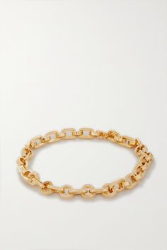 Miami-born Martha Calvo's jewelry is famed for fusing "uptown elegance with a downtown edge" - it means each piece feels contemporary but infinitely wearable, too. This 'Bond' necklace is made up of alternating oval and octagonal gold-plated chain links. Wear yours solo or tap into the maximalist ethos and layer it with a charm necklace. Designer Gold-tone Metal Jewelry, Designer Polished Gold Jewelry, Designer Gold Jewelry With Polished Finish, Luxury Metal Jewelry With Rectangular Links, Designer 14k Gold Polished Jewelry, Designer 14k Gold Jewelry With Polished Finish, Designer Yellow Gold Jewelry With Polished Finish, Designer Gold-tone Tarnish Resistant Jewelry, Modern Gold-tone Chain Bracelet For Formal Occasions