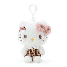 a hello kitty keychain with a bow on it