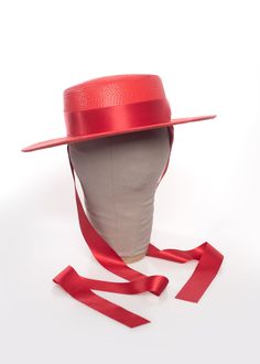 This full-size red faux straw hat is trimmed with luxe bright red ribbon. Ribbon ends are pinked. Nice and structured, not floppy, with a wide brim. Inspired by one of my older hat designs that was featured in Marie Claire (last image). Fits up to a 23" head size. Material: 100% Polypropylene Crown Width: 6.5 inch Crown Height: 3.25 inch Brim Width: 3 inch Ships in a hat box. This item is OVERSIZED so unfortunately shipping will be quite high. All pieces are MADE TO ORDER. Please contact us if y Ribbon Ends, Hat Box, Ribbon Tie, Red Ribbon, Make Time, Marie Claire, Wide Brimmed, Straw Hat, Hat Designs