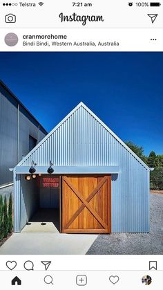 the instagram page for instagram com shows an image of a blue barn with wooden doors