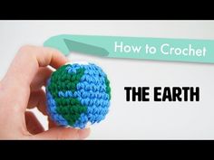 someone is holding a crochet ball with the words how to crochet on it