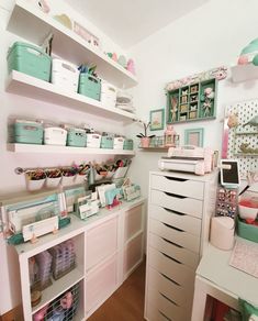 a room filled with lots of crafting supplies and storage containers on top of shelves