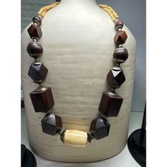 The vintage geometric large wooden bead necklace is a striking and contemporary piece of jewelry that blends natural elements with modern design. The necklace features oversized wooden beads, each meticulously carved into geometric shapes. The use of wood adds a rustic and earthy feel to the necklace, while the geometric shapes infuse it with a sense of sophistication and edginess. Size: 28" Excellent Vintage Condition Wooden Bead Necklace, Wooden Bead Necklaces, Wood Bead Necklace, Chunky Jewelry, African Jewelry, Natural Elements, Wooden Beads, Bead Necklace, Wood Beads