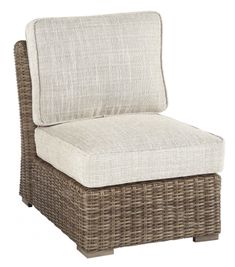 an outdoor wicker lounge chair with cushion on the back and seat upholstered