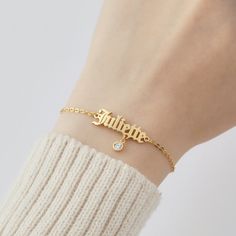 "A simply stunning name bracelet with a little hanging birthstone charm. It will be a super cute and dainty gift for anyone you love. ► PRODUCT INFORMATION * Material: High Quality Solid 925 Sterling Silver * Finishing: Silver, Gold or Rose Gold. * Word limits: up to 9 characters for best visibility. * Letter size: approx. 7/32 ~ 5/16 inch (5.4 - 8.1mm) * Sizing are as follow: XS: bracelet's diameter is 2\", bracelet's circumference is 6\" S: bracelet's diameter is 2.25\", bracelet's circumferen Delicate Personalized Name Bracelet, Personalized Delicate Name Bracelet As A Gift, Delicate Personalized Name Bracelet As A Gift, Delicate Personalized Name Bracelet As Gift, Delicate Personalized Name Bracelet For Gift, Adjustable Dainty Name Charm Bracelet, Dainty Custom Name Charm Bracelet For Gift, Elegant Custom Name Charm Bracelet As Birthday Gift, Elegant Custom Name Charm Bracelet For Birthday Gift