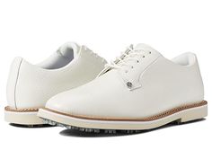 GFORE Seasonal Collection Gallivanter - Men's Shoes : Snow/Khaki : Get ready for game of golf wearing G/FORE Seasonal Collection Gallivanter sneakers. Leather upper. Polyester lining and insole. Lace with slip-on closure. Round toe. TPU outsole. Imported. Weight of footwear is based on a single item, not a pair. Classic White Low-top Golf Shoes, Classic Low-top Golf Shoes With Cushioned Footbed, Classic Low-top Cushioned Golf Shoes, Golf Sneakers With Rubber Sole And Round Toe, White Slip-resistant Golf Shoes With Round Toe, Classic Low-top Golf Shoes With White Sole, White Golf Shoes With Rubber Sole, Classic Leather Golf Shoes, White Low-top Golf Shoes With Textured Sole