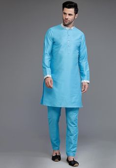 Cotton Silk Kurta in Light BlueThis Readymade Chinese Collar Neck and Full Sleeve attire is Enhanced with ButtonsAvailable with a Cotton Silk Pant in Light BlueDo note: Footwear shown in the image is for presentation purposes only. Half to one inch may vary in measurement. (Slight variation in actual color vs. image is possible) We sell all kinds of menswear. Mens Kurta | Mens Kurta Pajama | Mens Sherwani | Mens Sherwani Sets | Traditional Menswear | Partywear Menswear | Indian Mens Dresses | Di Blue Fitted Kurta For Spring, Indian Jackets, Mens Sherwani, Chinese Collar, Party Mode, Nehru Jackets, Ethnic Dress, Indian Festivals, Silk Pants