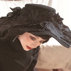 An elegant hat with a wide, drooping brim that gives it the look of a seductive black magician. The design decorated with feathers has a heretical atmosphere. Try wearing black to create a mysterious charm. 
 
 
 Size 
 
 FREE size 
 
 Head circumference: 56-58cm 
 Brim: 15cm 
 Depth: 8.2cm 
 
 
 
 
 Material 
 
 Wool Elegant Black High Crown Costume Hat, Formal Black Wide Brim Costume Hat, Witchy Winter Party Costume Hats And Headpieces, Gothic Winter Costume Hats And Headpieces, Black Formal Winter Costume Hat, Formal Black Winter Costume Hat, Formal Black Costume Hats For Winter, Winter Formal Black Costume Hats And Headpieces, Black Curved Brim Costume Hat For Church