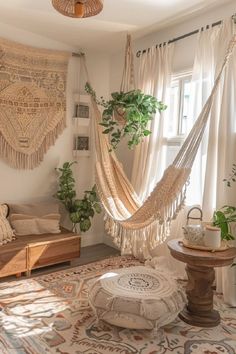 a hammock hanging from the ceiling in a living room