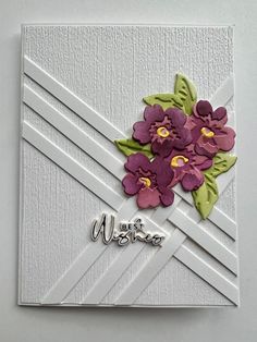 a close up of a card with flowers on it