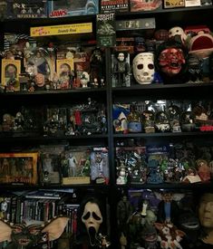 a shelf filled with lots of toys and masks