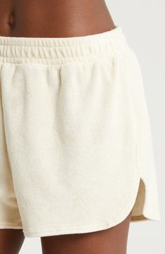 Get away in the retro styling and supersoft terry knit of these shorts made with a relaxed, vacation-enhancing fit. 3" inseam; 26" leg opening; 12" front rise; 16" back rise (size Medium) Elastic waist 85% cotton, 15% spandex Machine wash, tumble dry Made in the USA of imported fabric Thrift Manifest, Sweat Shorts Women, Clothes Wishlist, Shot List, Terry Shorts, Bare Necessities, Beyond Yoga, Comfy Shorts, Lounge Shorts