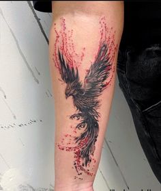 a person with a bird tattoo on their arm and leg is shown in red ink