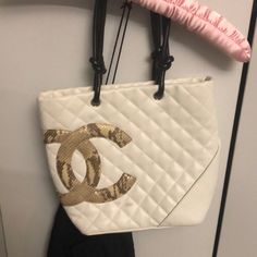 Lightly Used White Chanel Cambon Tote Luxury Square Bag For Errands, Designer Beige Shoulder Bag Fashion Accessory, Luxury Square Shopping Bags, Designer Large Capacity White Shoulder Bag, Luxury Square Shoulder Bag For Shopping, Designer White Bags With Large Capacity, Luxury White Shoulder Bag With Large Capacity, Designer Large Capacity White Bags, White Luxury Large Capacity Shoulder Bag