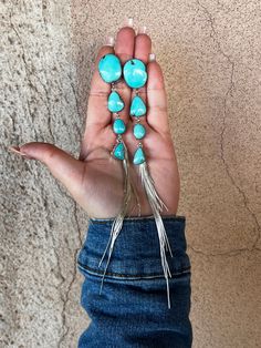 These are so beautiful! They scream NFR! These are versatile and can be worn with or without the tassel. Very easy to switch looks! Created by Navajo artist David Lopez. Teardrop Tassel Jewelry, Hey Girl Hey, Shoulder Duster Earrings, Duster Earrings, Liquid Silver, Boho Chic Jewelry, White Buffalo, Hey Girl, Green Turquoise