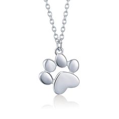 Sterling silver paw print represents cat or dog Your choice of platinum plating, rose gold plating or 18k gold plating Paw pendant approx. 0.55" W (1.4 cm) x 0.59" H (1.5 cm) Chain length approx. 18" (46 cm) Extension chain approx 4" (10 cm) Matches the Paw Stud Earrings Note: Please allow 2-3 weeks for delivery. However, you may experience additional delays due to COVID-19. Cat Paw Necklace, Dog Paw Pendant, Paw Print Pendant, Pet Paw Print, Paw Print Necklace, Cat Paw Print, Silver Cat, Lovely Jewellery, Copper Jewelry