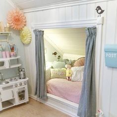 a child's room with a bed and toys