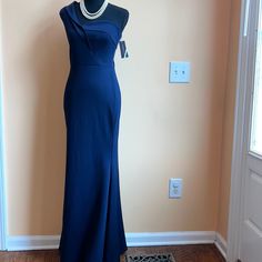 Rfo Navy Blue Gown Size 95% Polyester 5% Spandex Machine Wash Cold Measurements Bust 34 “ Waist 28” Hip 34” Length 49” Blue Fitted Elastane Maxi Dress, Evening Blue Elastane Dress, Blue Stretch Maxi Dress For Prom, Fitted Full Length Blue Evening Dress, Fitted Blue Maxi Dress With Sweep Train, Blue Fitted Full Length Evening Dress, Blue Elastane Evening Maxi Dress, Blue Stretch Maxi Dress For Evening, Elegant Blue Maxi Dress