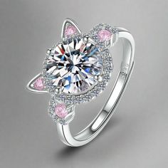 Introducing the Kitten Adjustable Ring - a delightful and whimsical accessory crafted from 925 sterling silver. This enchanting ring features a playful kitten design adorned with sparkling zircon stones, adding a touch of elegance and shimmer. Its adjustable band ensures a comfortable and perfect fit for any finger. This sparkling ring is an ideal gift for cat lovers or a charming addition to your own jewelry collection, blending cuteness with sophistication. Kitten size: 8mm Ring size: 17mm / a Silver Cat Design Jewelry For Mother's Day, Silver Cat Design Ring, Silver Cat Design Jewelry For Anniversary, Silver Cat Design Promise Ring, Silver Promise Ring With Cat Design, Cat Design Jewelry Ring As A Gift, Anniversary Rings With Cat Design, Anniversary Cat Design Rings, Sterling Silver Cat Design Jewelry For Anniversary