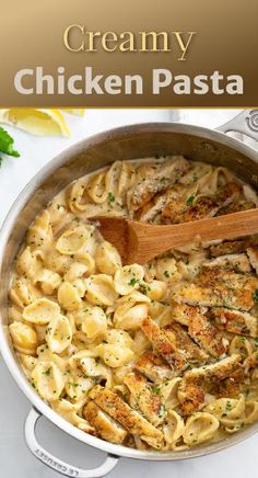 creamy chicken pasta in a skillet with a wooden spoon on the side and text overlay that reads creamy chicken pasta