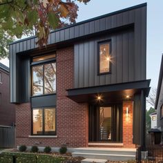 a modern home with brick and steel siding