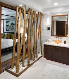 the bathroom is decorated with bamboo sticks