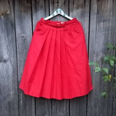 Red vintage skirt for woman. High Waist Pleated skirt midi  Size 42    65%Polyester,35% Cotton Label:Diolen Made in West Germany See the measurements: Waist: 79 cm ( 31 inch ) Length: 74 cm (29 inch) Red Flared Pleated Skirt For Work, Red Cotton Midi Skirt, Red Gathered Midi Skirt, Red Knee-length Pleated Skirt For Spring, Red Pleated A-line Skirt, Red Retro Pleated Skirt, Retro Red Pleated Bottoms, Red Pleated Knee-length Skirt, Vintage Red Skirt For Workwear