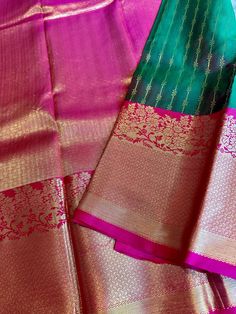 Super gorgeous, Traditional and festive , pure, silk mark certified Kanchi Silk saree. The saree is silk mark certified and comes with a contrast blouse piece and contrast pallu. Body is a lovely dual tone green and subtle hues of oil red in the mix. Border and pallu are a very detailed and intricate and lovely pink shade. Border is big border and has intricate craftsmanship. Falls, pico can be done for an extra price. Blouse stitching can be done at an additional price. Dual tone, grand, silk mark certified Kanchi Silk Saree with Big Border | kanchipuram silk | kanchi pattu online shopping usa | kanjivaram | ethnic | Diwali | bridal kanjivaram | navratri | Durga puja | pujo Blouse Stitching, Pink Shade, Contrast Blouse, Silk Sari, Blouse Piece, Pure Silk, Silk Saree, Diwali, Silk Sarees