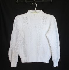 "Cable Knit Sweater Vintage White 100% Cotton Mock Turtleneck Heavy Cotton Sweater  This vintage sweater is a heavy cotton knit with beautiful cable knit designs.  This is the perfect Christmas Holiday Gift! ✅ Size: Women's Size Small See the photos for measurements. Measurements of this sweater when lying flat: Armpit to armpit: 19 1/2\" Shoulder to Bottom Hem Length: 20 1/4\" Armpit to Sleeve Hem: 16\" Bottom Hem: 13\" Excellent vintage condition for its age and use. There are no broken thread White Cable Knit Long Sleeve Polo Sweater, Classic Cotton Sweater With Pointelle Knit, Winter Cotton Cable Knit Polo Sweater, White Turtleneck Sweater With Pointelle Knit, Winter Cotton Pointelle Knit Sweater, Classic Cotton Cable Knit Sweater, Classic White Pointelle Knit Sweater, Winter White Pointelle Knit Sweater, White Pointelle Knit Sweater For Winter