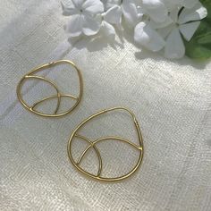 🔥 Sparkle up your outfit with these stunning Geometric Gold Hoop Earrings! 💫 Elevate your style game with our latest accessory for just $46.00! ✨ Don't wait, grab yours now! 💛 #geometricearrings #goldhoops #accessorizeinstyle #jewelrytrends #musthave #sparkleandshine #shopnow #fashionforward #elevateyourlook #treatyourself #EcofiedHome Geometric Hoop Earrings, Sustainable Jewelry, Everyday Earrings, Metal Casting, Gold Hoop, Gold Hoop Earrings, Wearable Art, Peru, Gold Earrings