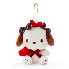 a white stuffed animal with a red bow on it's head