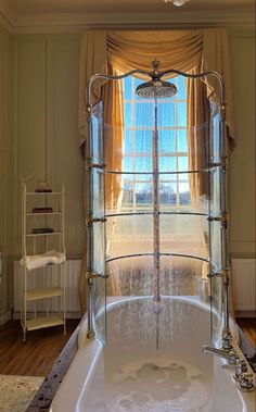 a large bath tub sitting next to a window