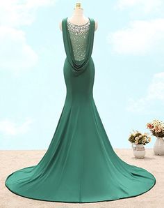 Green Corset-back Evening Dress For Prom, Green Corset Back Evening Dress For Prom, Green Backless Prom Gown, Green Backless Gown For Prom, Prom Season Mermaid Dress With Corset Back, Fitted Ball Gown With Sweep Train For Prom, Fitted Sleeveless Ball Gown For Homecoming, Prom Mermaid Dress With Fitted Bodice And Sweep Train, Prom Mermaid Dress With Sweep Train And Fitted Bodice