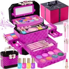 an assortment of cosmetics and makeup in a pink case