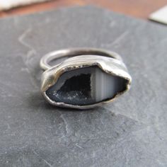 "Silver Mini Geode Ring Gray Druzy Ring Sparkly Druse Gemstone Ring: A stunning, one-of-a-kind, handmade stackable ring featuring a natural sparkling druzy geode set in sterling silver. The geode is gray and white and it measures 11/16\" by 7/16\". Band is 1/16\" wide. The ring itself is a size 6. Completely handmade by myself in sterling silver. Enter my shop: https://www.etsy.com/shop/artdi Join me on Facebook: https://www.facebook.com/Artdi-Diana-Anton-Jewelry-Design-44805607932/ Find me on I Industrial Earrings, Geode Ring, Geode Necklace, Rings Handmade, Sterling Silver Bangle Bracelets, Stacking Ring Set, Family Jewels, Sparkling Rings, Silver Bangle Bracelets