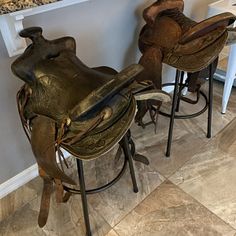 two stools that have been made to look like horses