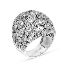 Make a fashion statement with our Diamond Pave Dome Cocktail Ring. Hand made with 18K white gold, this ring features a cluster of elongated hexagons paved with three small round brilliant cut diamonds crafted in a dome shape. The perfect gift for a woman who enjoys standing out in a crowed with unique designer jewelry pieces. Available in all sizes, send us yours! 2.67 carat cocktail ring 14K white gold The ring design can be customized to suit your particular taste & budget with any Size, C Cocktail Ring Designs, Crossover Diamond Ring, Bling Ideas, Rose Gold Diamond Ring, Ring Hand, Unique Jewelry Designs, Blue Sapphire Rings, Love Ring, Diamond Cluster