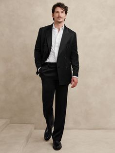 A fresh take on the season's relaxed suit pants, we cut this pair from a special fabric woven by Italy's Emmetex mill that we love for its sophisticated shine and touch of warm wool.  Mid rise.  Straight fit.  Fabric from Italy's Manifattura Emmetex.  Zip fly with button and hook-and-bar closure.  Front and back pockets.  Lined to the knee. Mid rise, straight fit.  Inseams: Short 29", Regular 30", Long 33" Model: Size 32x32, 6'2" (188cm). Black Gala Outfit Men, High Waisted Suit Men, Black Formal Wear Men, Black Suit Men Outfit, Men Black Tie Wedding Guest Attire, Black Suit Outfit Men, Black Suit No Tie, Formal Wedding Guest Men, Solangelo Wedding